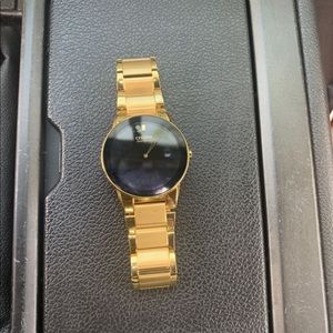 CITIZEN Eco-Drive watch.